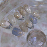 24Pcs Glitter Blue French False Nails Press on Short Round Head Fake Nail with Moon Star Design Artifical Almond Manicure Tips