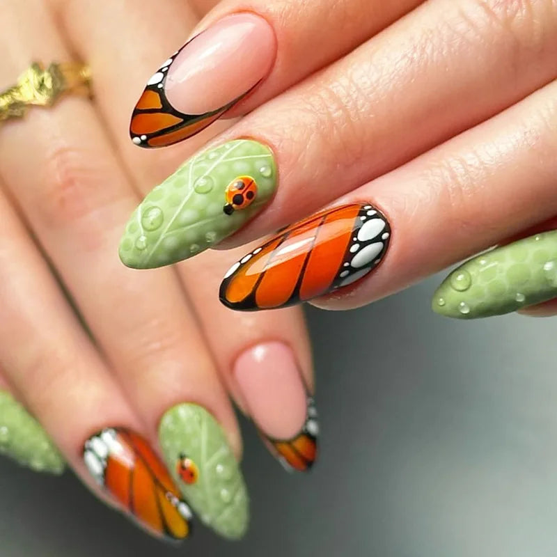 24Pcs Mid-length Blue Almond False Nails with 3D Shell Design Press on Nails Tips Butterfly Flower Pattern Datachable Fake Nail
